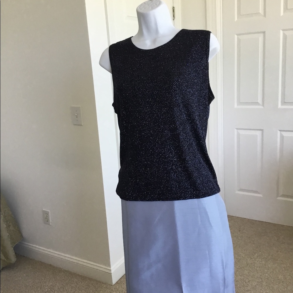 Slightly worn navy Sequence sleeves top.